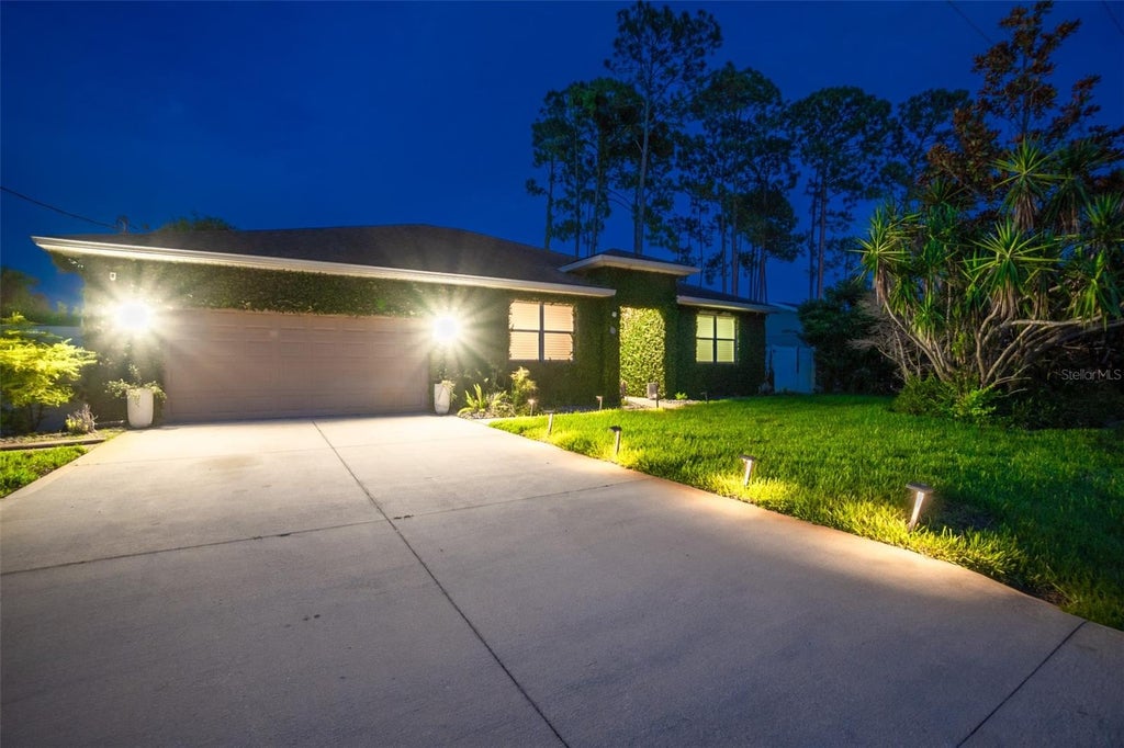 Photo of 59 Beaverdam Lane, Palm Coast, FL 32137 (MLS # FC318920)