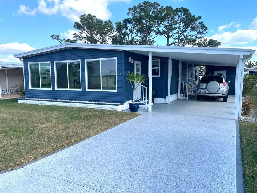 Great turn-key furnished home in the popular retirement community of Harbor Isles.  All the big ticket items are done with new siding, new windows throughout, new plywood subfloors and flooring, new carport, new Florida room with glass windows, new membrane roof and new electric panel.  Hot water heater 2018 and A/C 2018.  The home enjoys an open concept and is bright and airy inside.  The primary bedroom has a walk-in closet and an en-suite bath.  An added bonus is the guest bedroom also has direct access to a private bath.  Beautiful new laminate in the living area and new carpet in the bedrooms and Florida room.  Harbor Isles is land owned and pet friendly.  The amenities are immaculate and modern with a myriad of activities year round.  The marina has a pavilion, boat launch, canoe/kayak launch, boat slips, fishing station, and an active boat club.  The community is convenient to beaches, shopping, entertainment, Atlanta Braves ball field, downtown Wellen Park, Sunseeker Resort, interstate, airports and more.  Call today for a virtual or or personal tour!