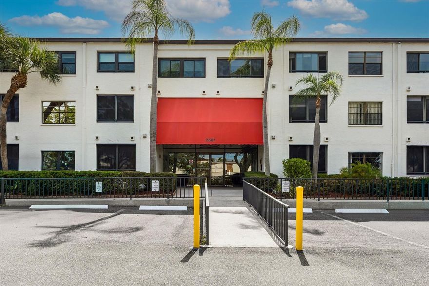 One or more photo(s) has been virtually staged. Exceptional Value in Inverness – Spacious 55+ Condo with Resort-Style Living
Discover one of the largest and most desirable units in the sought-after Inverness Condominium community. This bright, open-concept home sits in a secure key-entry building with elevator access and offers peaceful countryside views, low HOA fees, and no flood insurance required.
Dramatic vaulted ceilings and a split-bedroom floorplan create a spacious, comfortable feel. The beautifully remodeled kitchen is a standout, featuring custom cabinetry with an abundance of drawers, sleek Corian countertops, and stainless steel appliances. It flows seamlessly into the expansive living room, with sliders opening to a massive screened-in balcony — perfect for enjoying morning coffee or evening breezes.
The generous primary suite is a true retreat with a large walk-in closet, en-suite bath, and private balcony access. Two additional bedrooms (one currently used as an office) share a well-designed full bath. Additional highlights include a separate dining room, inside utility room with washer and dryer, and abundant natural light throughout.
The community is exceptionally well-maintained with strong reserves and a milestone inspection that passed with flying colors. The low monthly condo fee of $653.54 includes cable TV, high-speed internet, water, sewer, trash, pest control, building security cameras, pool, tennis courts, and full exterior maintenance. This unit also includes a covered parking space plus ample guest parking.
Conveniently located across the street from Westfield Countryside Mall, you’re just steps from shopping, dining, and everyday conveniences.
Rarely does a home this large, updated, and carefree become available in such a desirable 55+ community. Don’t miss this opportunity!