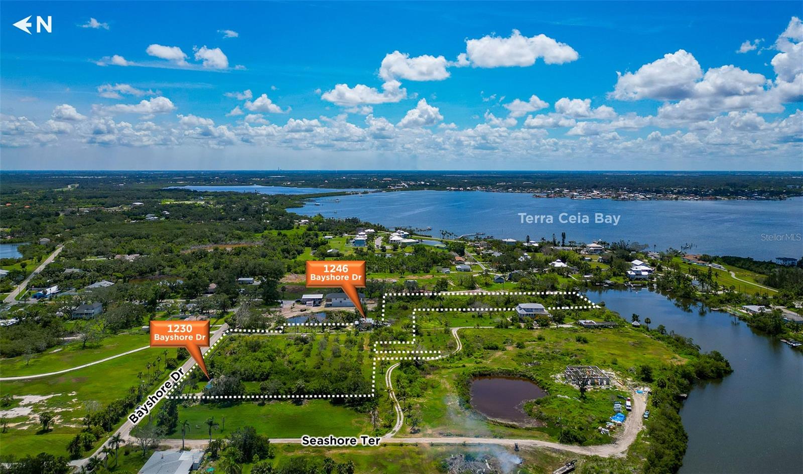 Discover the potential of this rare offering — six total lots being sold together as one expansive property, ideally situated near the sparkling waters of Terra Ceia. This prime location offers endless possibilities for development, investment, or creating your dream estate. The property currently features two tear-down houses, providing a clean slate for your vision. Whether you're looking to build multiple homes, a private retreat, or simply invest in valuable land in this highly sought-after area, this is your chance. Enjoy the tranquility and natural beauty of Terra Ceia, with easy access to boating, fishing, and all that coastal living at it's finest. Opportunities like this don’t come around often — six lots, one unbeatable location, and limitless potential. Don't miss your chance to own a significant piece of paradise!