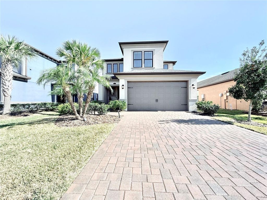 Photo of 4746 Tramanto Lane, Wesley Chapel, FL 33543 (MLS # TB8346420)