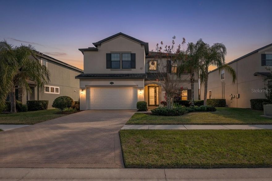 Welcome home to 19326 Long Lake Ranch Blvd in Lutz, where space, style, and community come together beautifully.

This thoughtfully designed 5-bedroom, 3-bath home offers exceptional flexibility, including a full bedroom and bath on the first floor?. Perfect for guests, multigenerational living, or a private home office. From the moment you step inside, you’ll feel the openness and flow of the main living areas, ideal for both everyday living and entertaining.

The heart of the home is the upgraded gourmet kitchen, featuring solid wood cabinetry, granite countertops, stainless steel appliances, a built-in oven and cooktop, and a stunning blue glass backsplash that adds the perfect pop of personality. A large island with bar seating, breakfast nook, and charming coffee nook across from the oversized pantry make this space as functional as it is inviting. The kitchen opens seamlessly to the living room, creating a warm, connected space, while the formal dining room offers versatility as a dining area or stylish home office.

Upstairs, you’re welcomed by a spacious bonus room at the landing, perfect for a media room, play space, or second living area. The primary suite is a true retreat, featuring grand double doors, a luxurious soaking tub, separate shower, private water closet, and two large walk-in closets, a dream for any fashionista.

Step outside to a large screened-in patio, an ideal setting for hosting friends and family or simply relaxing at the end of the day. The fully vinyl-fenced backyard provides privacy and peace of mind, all within a beautifully manicured neighborhood.

Located in the highly desirable Long Lake Ranch community, residents enjoy resort-style amenities including a zero-entry pool, splash pad, multiple playgrounds, tennis and basketball courts, scenic walking trails, and a picturesque lake. You’ll love the feeling of having everything you need right within the neighborhood, yet you’re just minutes from Dale Mabry Highway, offering easy access to Tampa, shopping, dining, and major commuter routes.

This home offers the perfect blend of comfort, elegance, and lifestyle. Come experience it for yourself...you won’t want to leave.