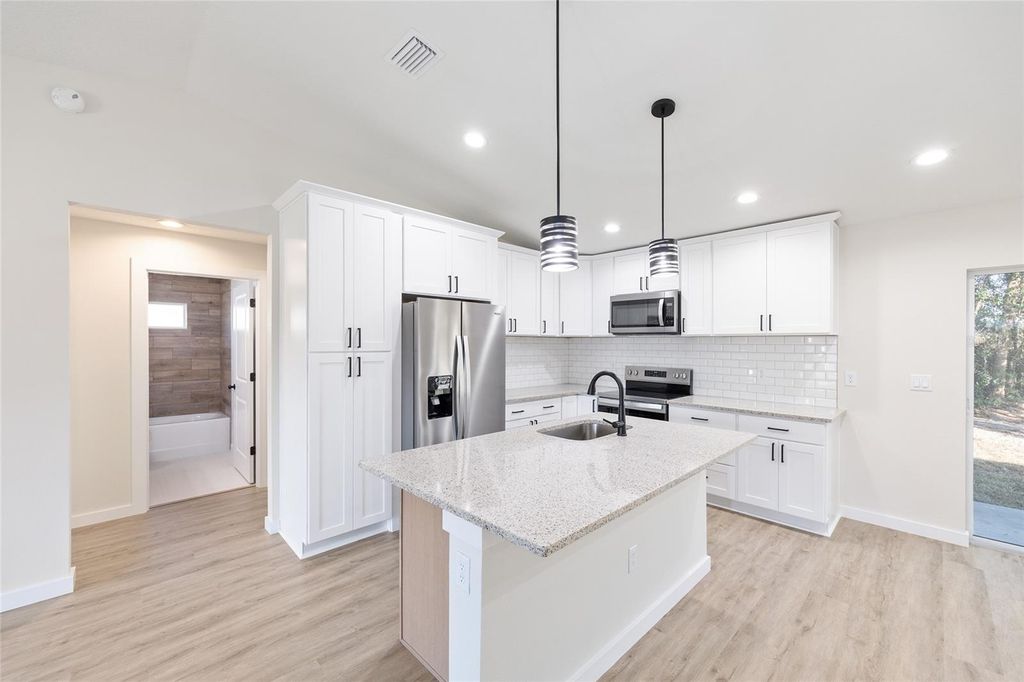 Photo of 13879 SW 101st Street, Dunnellon, FL 34432 (MLS # OM710228)