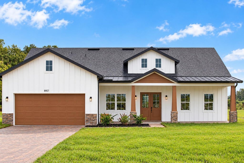 Photo of 8957 SE 12th Drive, Webster, FL 33597 (MLS # O6449756)