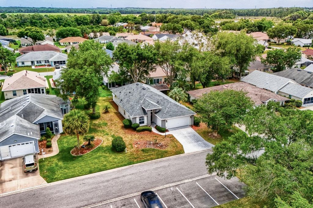 Photo of 6340 Highland Lakes Blvd, Leesburg, FL 34748 (MLS # O6407704)