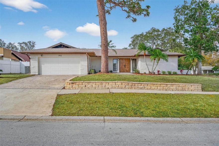 One or more photo(s) has been virtually staged. Fully Remodeled Pool Home – NO Flood Zone

Welcome to 2932 Sweetgum Way S, an impeccably renovated pool home offering style, comfort, and peace of mind in Clearwater — just minutes from charming Safety Harbor. Located in a NO flood zone, this property does not require flood insurance — a significant financial and lifestyle advantage for Florida homeowners.

The thoughtfully redesigned interior features a stunning new kitchen with elegant cabinetry, sleek countertops, and brand-new stainless steel appliances. Beautifully updated bathrooms showcase modern finishes, and quality upgrades throughout create a seamless, move-in-ready experience.

Step outside to your private backyard oasis complete with a sparkling pool — perfect for relaxing or entertaining year-round in the Florida sunshine.

Ideally positioned to enjoy the best of both Clearwater and Safety Harbor, this home offers easy access to vibrant, walkable downtown Safety Harbor with its popular dining spots like Bar Fly Safety Harbor, Southern Fresh, and Gigglewaters. Residents enjoy community favorites such as the 3rd Friday Street Celebration, Art & Seafood on the Water each February, and Pickin’ in the Park. Outdoor enthusiasts can explore the scenic waterfront at Philippe Park or enjoy boating and sunset views at the Safety Harbor Marina.

You’re also just a short drive from the award-winning beaches of Clearwater Beach and have convenient access to the Pinellas Trail for biking and walking. The greater Tampa Bay area offers endless entertainment, including downtown St. Petersburg with The Dalí Museum, and Tampa featuring the Tampa Riverwalk and Busch Gardens Tampa Bay. Sports fans can cheer on the Tampa Bay Buccaneers, Tampa Bay Lightning, and Tampa Bay Rays.

Exceptional value in a desirable area where homes don't go up for sale often and sell quickly. Don’t miss this opportunity to own a beautifully updated pool home while enjoying the best of Clearwater and nearby Safety Harbor living.