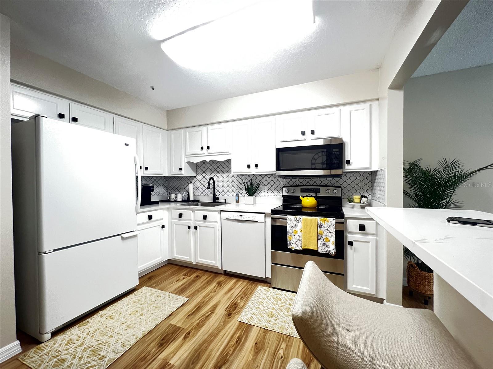 COACH HOMES AT ERROL ESTATES - Residential
