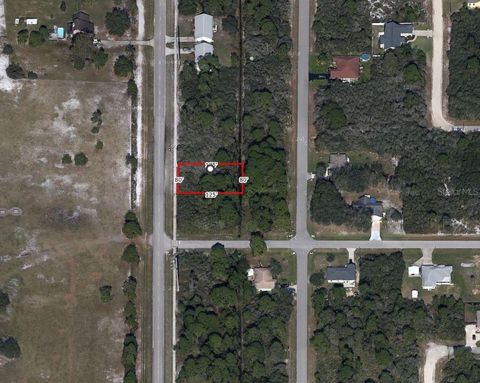 Photo of 818 Cougar Boulevard, Sebring, FL 33872 (MLS # O6398741)