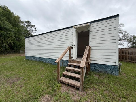 Tiny photo for 683 N Court Street, Bronson, FL 32621 (MLS # GC539159)