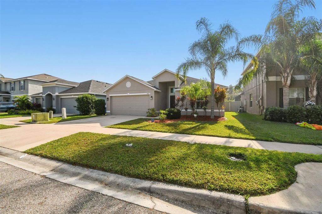 Photo of 8439 Hunters Fork Loop, Ruskin, FL 33573 (MLS # TB8452163)