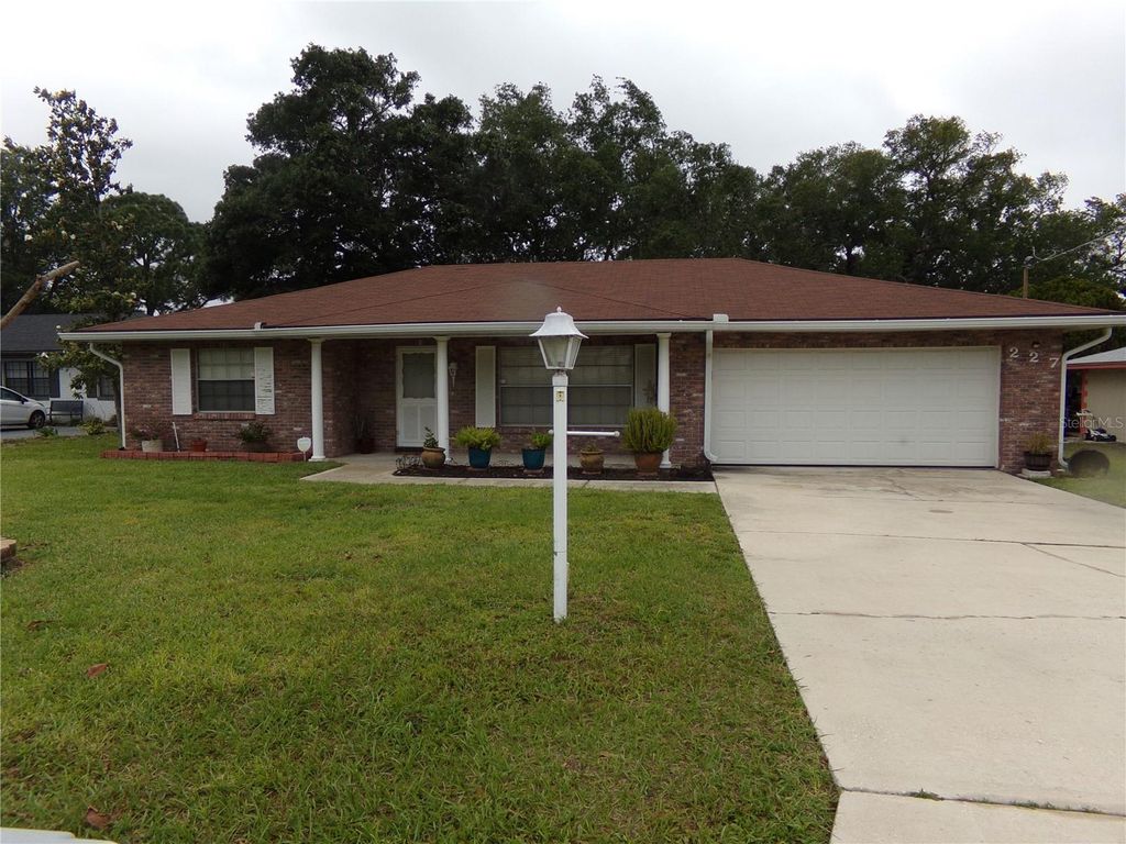 Photo of 227 Volusia Drive, Winter Haven, FL 33884 (MLS # P4938372)