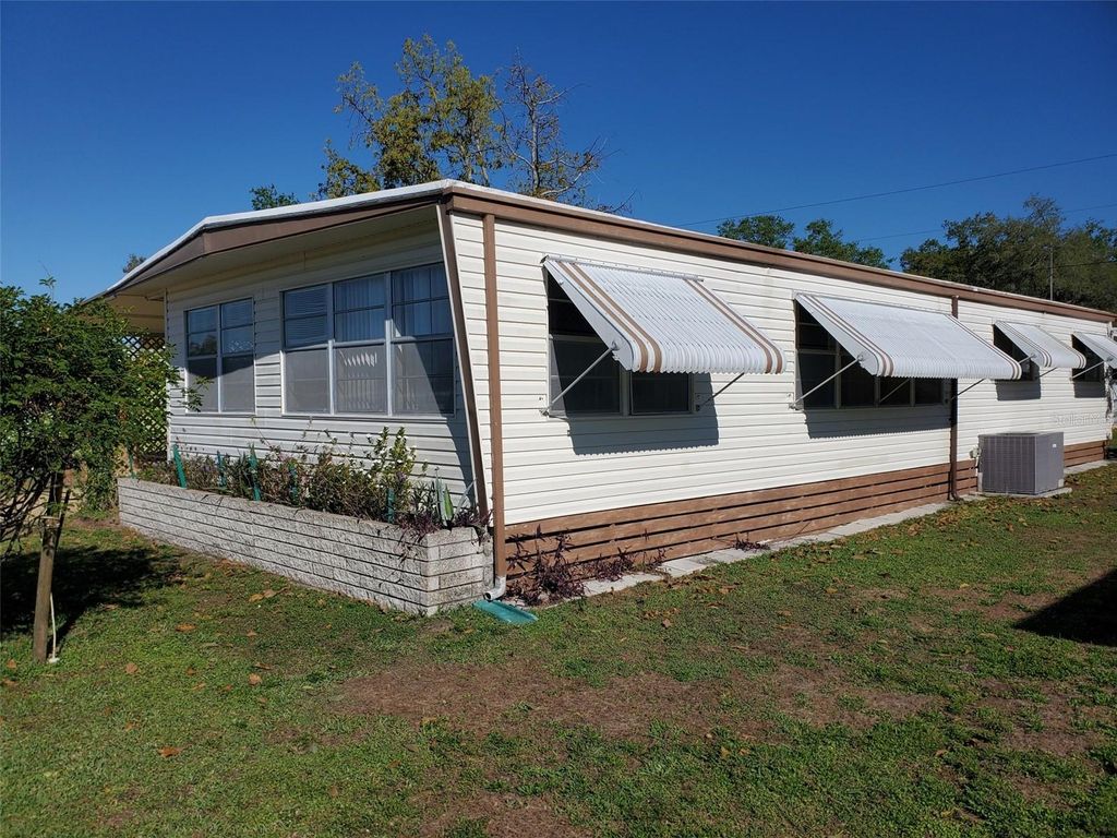 Photo of 39149 Flora Avenue, Zephyrhills, FL 33542 (MLS # TB8485136)