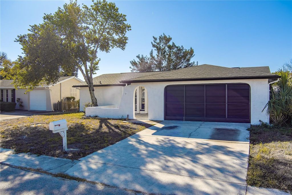 Photo of 8234 Medford Drive, Port Richey, FL 34668 (MLS # TB8471132)