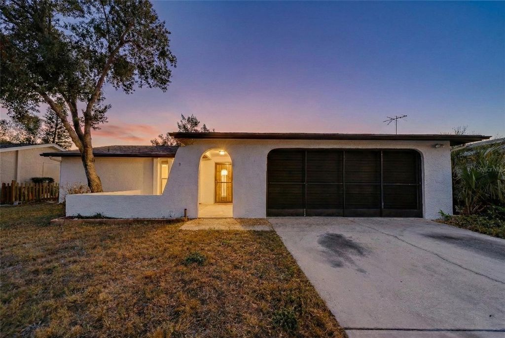 Photo of 8234 Medford Drive, Port Richey, FL 34668 (MLS # TB8471132)