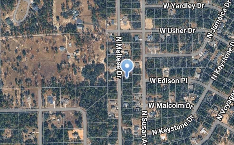 Photo of 7759 N Maltese Drive, Citrus Springs, FL 34433 (MLS # O6427742)