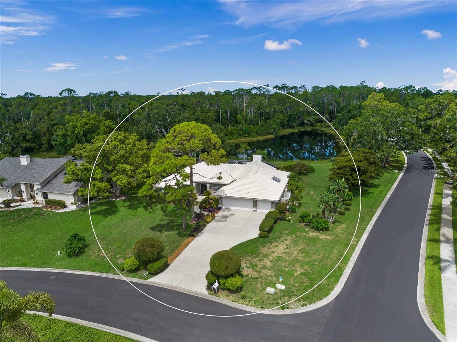 SAY HELLO TO A GOOD BUY * This IMMACULATE home is located on a QUIET CUL DE SAC with NO THROUGH TRAFFIC * Your Executive Family Home boasts a VERY PRIVATE SETTING on OVER 1/2 ACRE and BACKS TO A LARGE SPRING-FED LAKE * Rarely available in the GATED community of Woodlands at Bent Tree * PRIDE OF OWNERSHIP SHOWS * This Quality Built Home features 3 Bedrooms & 2.5 Baths PLUS a Den/Office with a Closet * Formal Living Room + Formal Dining Room * The Chef's Kitchen is open to the Family Room with a BEAUTIFUL Stone Fireplace * Vaulted Ceiling * This Split Plan designed home boasts volume + vaulted ceilings * SKYLIGHTS AND LARGE WINDOWS OFFER AN ABUNDANCE OF NATURAL LIGHT * This is NOT a cookie cutter home * The generously-sized Primary Suite showcases a Spa-style Bath with dual sinks, garden tub, walk-in shower, vanity and walk-in closets * Stunning curb appeal * 3 Car Garage * ALL OF THIS WRAPS YOUR PRIVATE OUTDOOR LIVING SPACE + OVERSIZED COVERED LANAI & CAGED POOL * This is the perfect home for entertaining or simply relaxing in your slice of paradise * SPACIOUS BACK & SIDE YARDS * 'A' RATED SCHOOL DISTRICT * Short drive to Siesta Key Beach * 20 minutes to UTC Mall or downtown Sarasota * Close to shopping & dining * One look & you'll fall in love *