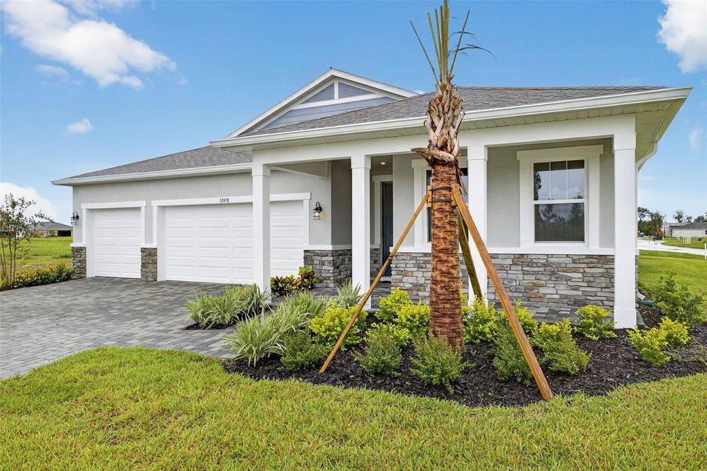 Photo of 12458 49th Street E, Parrish, FL 34219 (MLS # TB8333331)