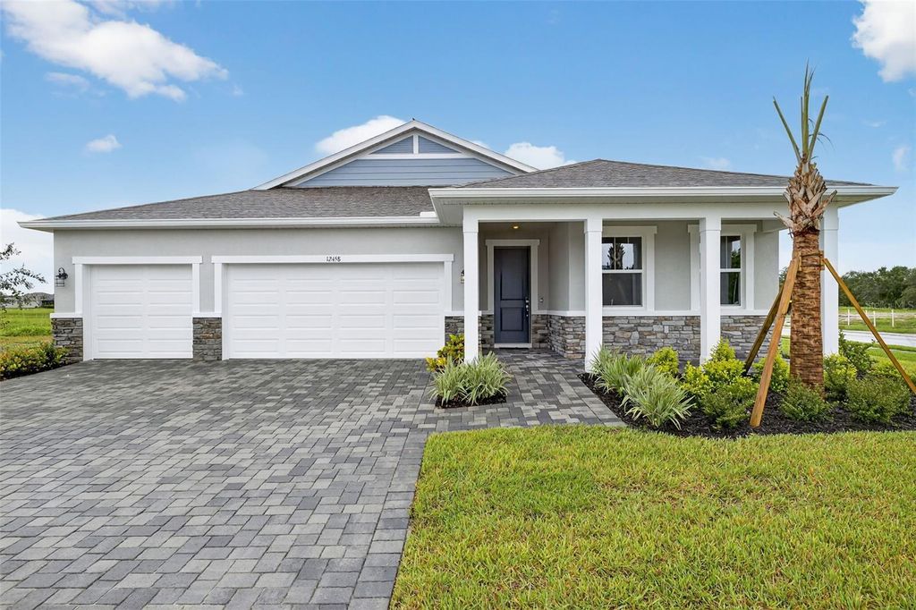 Photo of 12458 49th Street E, Parrish, FL 34219 (MLS # TB8333331)