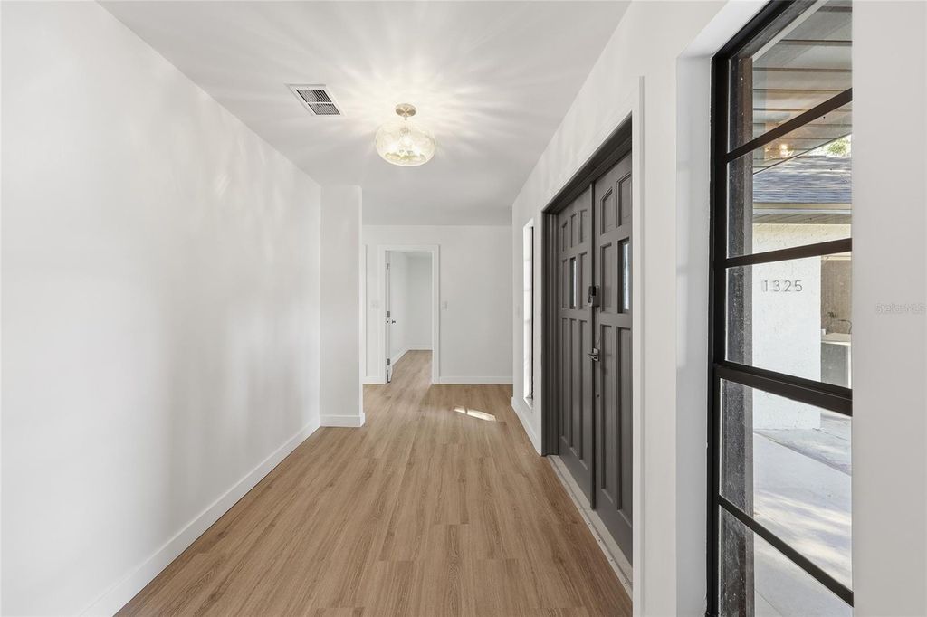 Photo of 1325 Riverside Drive, Tarpon Springs, FL 34689 (MLS # TB8474202)