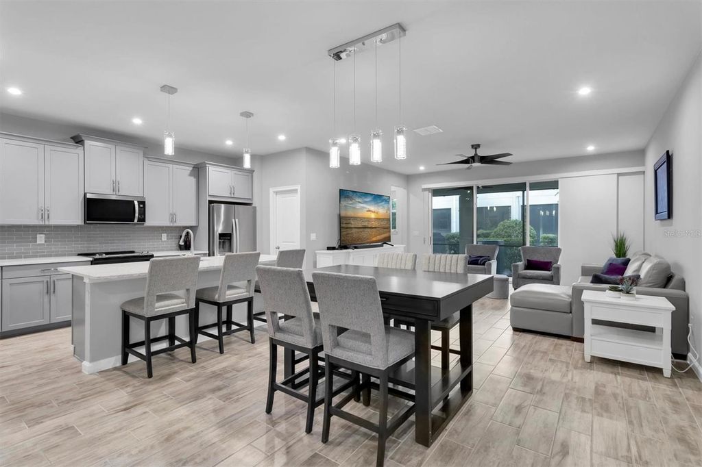 Photo of 19421 Monarch Wind Way, Lutz, FL 33558 (MLS # W7883052)