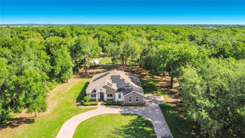 Photo of 1549 Lewis Road, Fruitland Park, FL 34731 (MLS # O6412455)