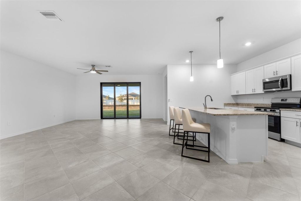 Photo of 1590 Saddlewood Circle, Port Charlotte, FL 33953 (MLS # C7522419)