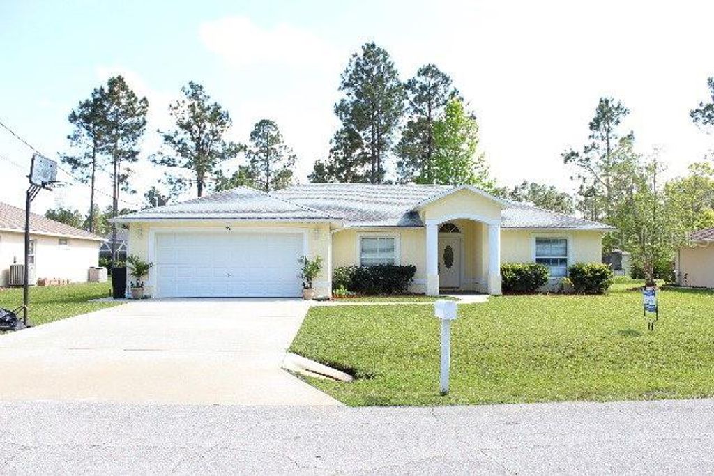 Photo of 45 Renworth Lane, Palm Coast, FL 32164 (MLS # FC318280)
