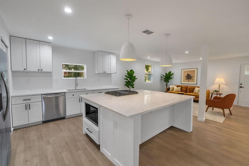 Photo of 107 W Virginia Avenue, Tampa, FL 33603 (MLS # TB8454440)