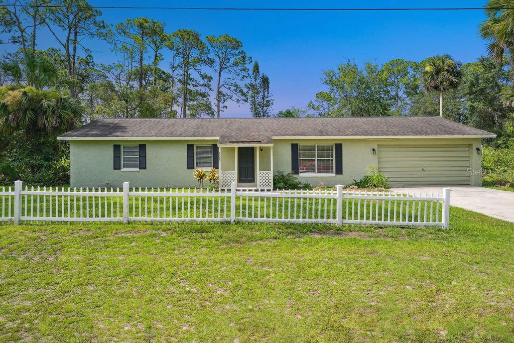 UNIQUE HOME AND LAND OWNERSHIP OPPORTUNITY! 3 ADJACENT PARCELS AVAILABLE-This single family home property features several unique features that must be seen to be appreciated! This 4-bedroom, 2.5-bath HOME with a 2-car GARAGE sits on the rear parcel and OFFERS a host of MODERN IMPROVEMENTS for COMFORTABLE LIVING: * Roof replaced in 2017 * New HVAC system INSTALLED in 2021 * Septic system with a NEW leach field REPLACED in 2021 * FRESHLY painted interior * Newer water heater for added efficiency * 100 lb. LEASED propane tank * Spacious rear screened porch – PERFECT for outdoor relaxation *** Zoned Flood Zone X – HIGH and DRY with NO flood INSURANCE requirements This move-in ready home COMBINES peace of mind with PRACTICAL updates—ideal for FAMILIES or INVESTORS seeking low-maintenance living. Less than HALF OF A MILE to the BEACH. PRIVATE setting with easy ACCESS to local shops, dining, and entertainment and of course- THE OCEAN! LOCATED in one of FLORIDA'S most beloved COASTAL towns, FLAGLER BEACH offers the perfect mix of LAID-BACK BEACH VIBES and vibrant COMMUNITY LIFESTYLE. With over eight miles of CINNAMON SAND BEACH, along with surfing, biking, walking trails, FISHING, and a bustling downtown filled with eclectic restaurants, bars, and boutiques, this is MORE than a property—it’s a LIFESTYLE. WOULD YOU LIKE TO OWN OVER 1 ACRE IN THE HEART OF FLAGLER BEACH?? IMAGINE THE POSSIBILITIES....