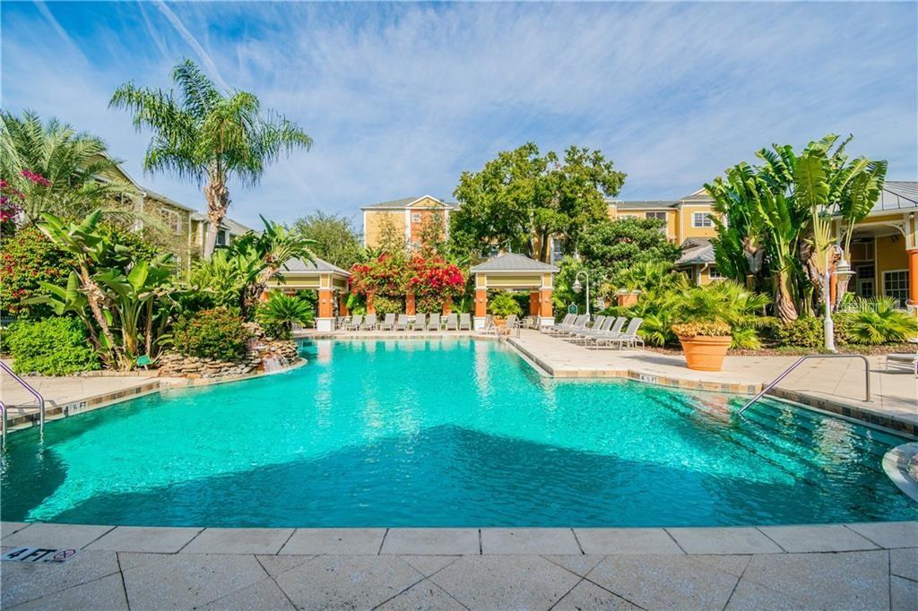Location, Location, Location! Spacious and nice, this 2nd floor 2bedroom/1bath in the desirable, resort style Grand Key community in South Tampa will "Wow" you! This unit features a sitting area in the living room for extra space, very large 1069 square feet heated area. The living area features beautiful wood flooring. Kitchen has a breakfast bar and inside laundry closet with the washer and dryer. The bathroom is large and the two bedrooms are spacious! There is one reserved parking space in front of the building and plenty of guest parking around the community. Grand Key is a wonderful tropical resort style GATED community located near Westshore, right off S Dale Mabry and convenient to trendy Water Street, Downtown Tampa, MacDill Airforce Base, Riverwalk, Hyde Park, restaurants, shopping and more! Close to I-275 and the Veteran's Expressway. Some of the amenities include a resort style pool, fitness center, and inside basketball courts! The community is well managed and maintained. The reasonable $393 monthly condo association fee includes valet trash pick up, inside pest control, nice landscaping, all amenities, building maintenance and insurance, on site management and more! Come and experience the Florida lifestyle at its best!