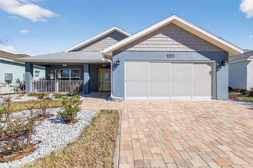 Location Location Location! Not to mention all the upgrades for this beautiful home. Just around a mile to Costco, Fresh Market, Marshalls, Publix, Olive Garden, Bonefish Grill, Starbucks, Ihop, doctor's offices, pharmacies and less than a mile to The Villages tunnel with a street legal golf cart. No CDDS, NO Bonds, only a low HOA with this gated entry home. Now, let's talk about the home! Absolutely no carpet, all upgraded wood look Porcelain tile throughout, large chef's kitchen with gas range, massive eat in kitchen island, large pantry, sliding glass doors going out of the kitchen to do your grilling on your 12 x 20 patio, a new storage shed is included, white vinyl fencing for your pets, garage screen to keep out the bugs and let out the heat for those hot summer days, a primary closet that is huge, primary shower with oversized roll in shower and private room for the water closet with extra closet for storage, a walk in closet in the 2nd bedroom, painted garage floor, landscape curbing, gas dryer, tankless gas water heater, separate irrigation meter, tall ceilings, crown molding, tray ceilings and so much more! This location is less than a mile from The Villages Charter School! Come check out the amenities too, like, tennis and pickleball court, basketball, playground, dog park, and walking trails. This is a must see home!