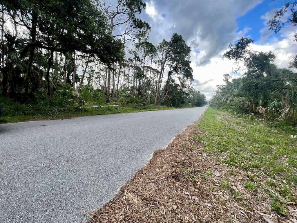 Photo of 13475 Ketridge Avenue, Port Charlotte, FL 33953 (MLS # C7494936)