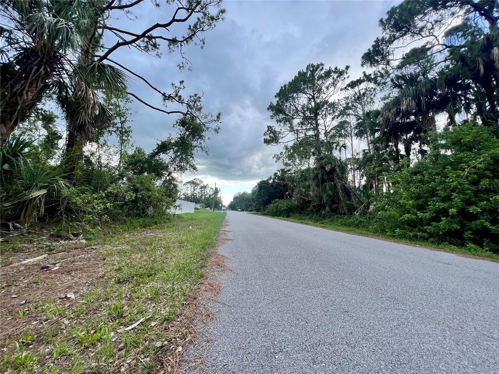 Photo of 13475 Ketridge Avenue, Port Charlotte, FL 33953 (MLS # C7494936)