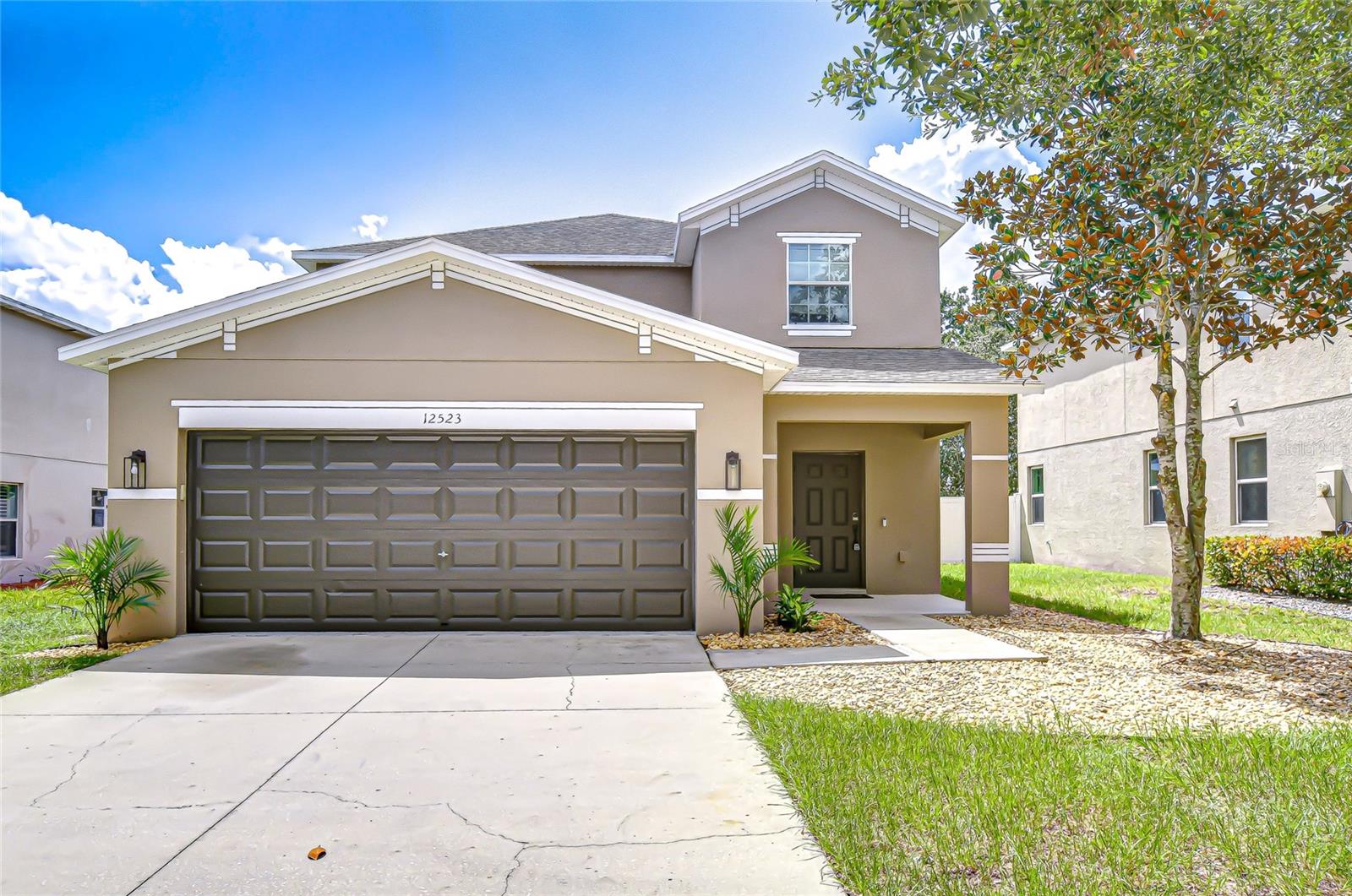 Step inside this NEWLY beautifully renovated St. Tropez model by Lennar, where timeless architecture meets modern updates in the heart of Lone Star Ranch community of Spring Hill. Designed for family-friendly living, this 5-bedroom, 3.5-bath home with 2,182 sq. ft. offers versatile spaces and stylish finishes, ready to impress from the very first glance.
The striking curb appeal sets the tone with a portico entrance, contrasting exterior paint color banding, and elegant coach lights welcoming you home. Inside, the main level showcases luxury vinyl plank flooring throughout, paired with fresh interior paint that enhances every corner. The chef’s kitchen delights with tall cabinets topped with crown molding, Granite counters, a peninsula breakfast bar, NEW stainless appliances (range, dishwasher, and microwave), recessed lighting, a café-style dining nook space. A convenient hi-bar opens seamlessly into the living and dining areas, creating the perfect backdrop for entertaining or everyday comfort. The kitchen hi-bar reaches out and flows seamlessly into open living and dining areas, creating the perfect backdrop for entertaining and everyday comfort. Sliding glass doors lead to the lanai.
The private first-floor primary suite features a spacious bedroom, walk-in closet, and ensuite bath with a dual sink vanity, and a glass enclosed tiled shower. A guest bath completes the downstairs.
Upstairs, a versatile loft anchors the second level, complemented by four generously sized bedrooms with NEW plush carpet, amply sized closets and two additional full baths, offering restful retreats. Step outdoors to your very own backyard escape, complete with a professionally installed above-ground pool (2018), surrounded by a paver patio—perfect for summer gatherings and weekend relaxation. Original Roof 2014! LOW HOA and NO CDD Fees keep ownership stress-free. Beyond the property, residents enjoy access to a resort-style community pool and cabana. Super convenient location near shopping, dining, and major commuter routes including SR-52 and the Suncoast Parkway, this home offers an easy drive to downtown Tampa and Tampa International Airport. Don’t miss your chance to make this gem located on the southern tip of Spring Hill your forever home—schedule your private showing today!