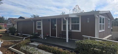 Photo of 20406 Peachtree Lane, Dade City, FL 33523 (MLS # W7882404)