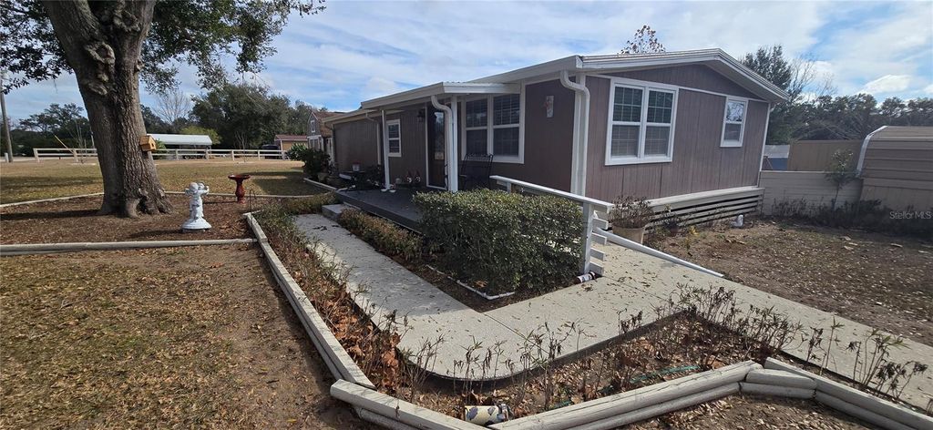 Photo of 20406 Peachtree Lane, Dade City, FL 33523 (MLS # W7882404)