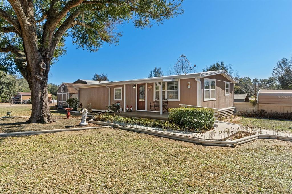 Photo of 20406 Peachtree Lane, Dade City, FL 33523 (MLS # W7882404)