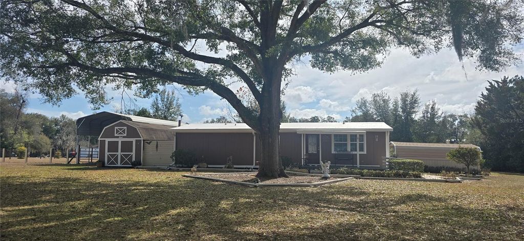 Photo of 20406 Peachtree Lane, Dade City, FL 33523 (MLS # W7882404)