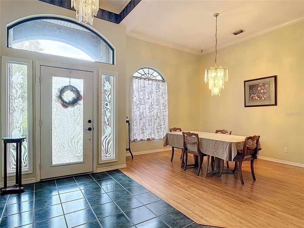 Photo of 520 Forest Creek Run, De Leon Springs, FL 32130 (MLS # V4945239)