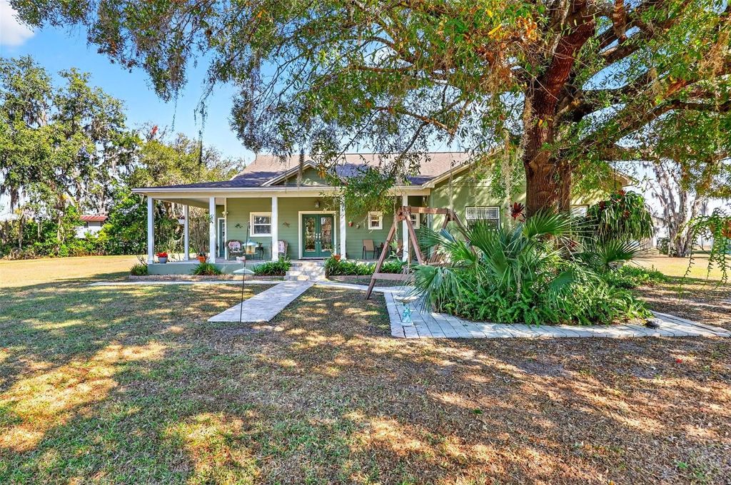 Photo of 8027 Ehren Cutoff, Land O Lakes, FL 34639 (MLS # TB8470012)