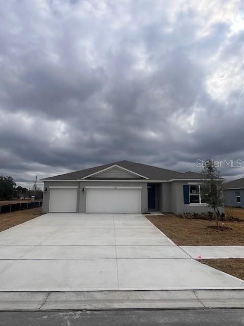 Photo of 1379 Scarlett Sage Lane, Sanford, FL 32773 (MLS # O6365077)