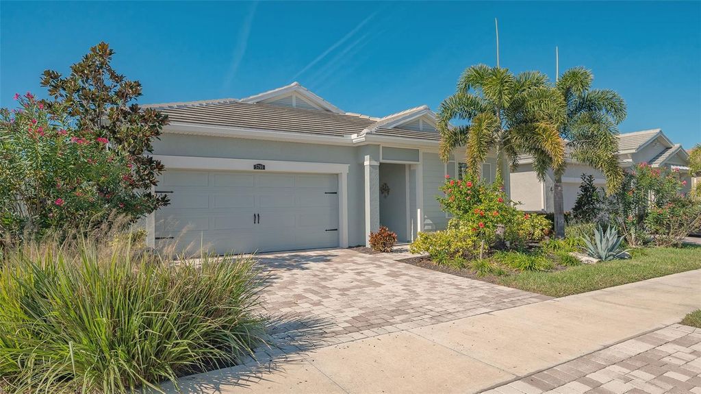 Photo of 5790 Long Shore Loop, Sarasota, FL 34238 (MLS # A4677927)