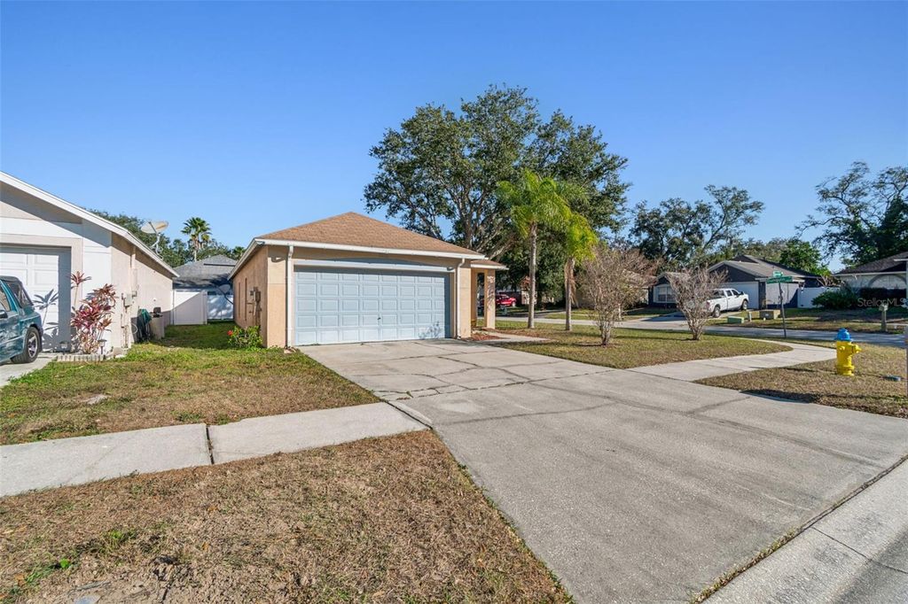 Photo of 11022 Connacht Way, Tampa, FL 33610 (MLS # TB8467626)