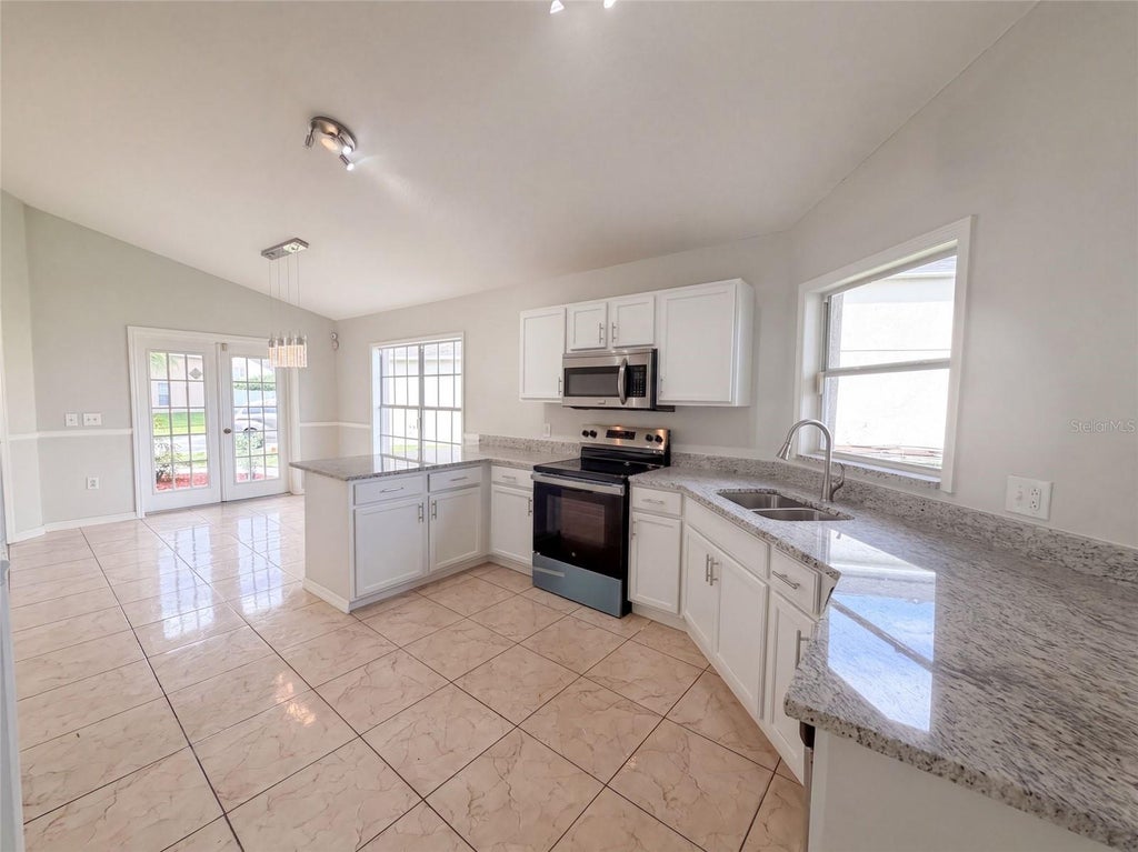 Photo of 225 Southbridge Circle, Kissimmee, FL 34744 (MLS # O6441701)