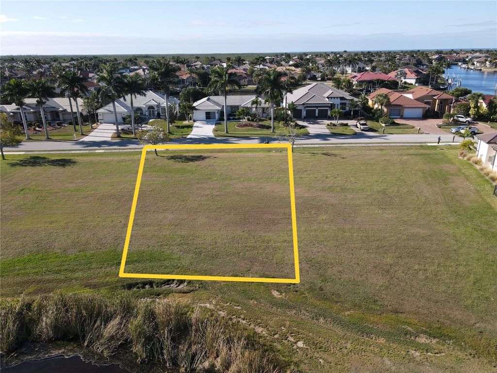 Photo of 627 Monaco Drive, Punta Gorda, FL 33950 (MLS # C7519546)