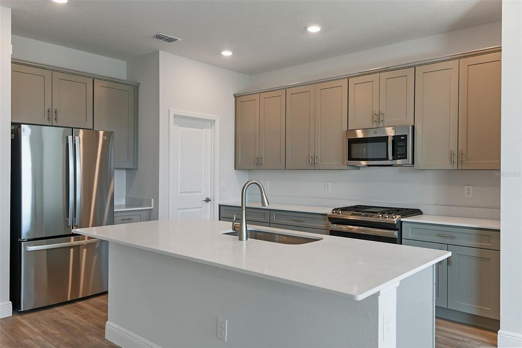 Photo of 9989 Surrey Rose Drive, San Antonio, FL 33576 (MLS # TB8386005)