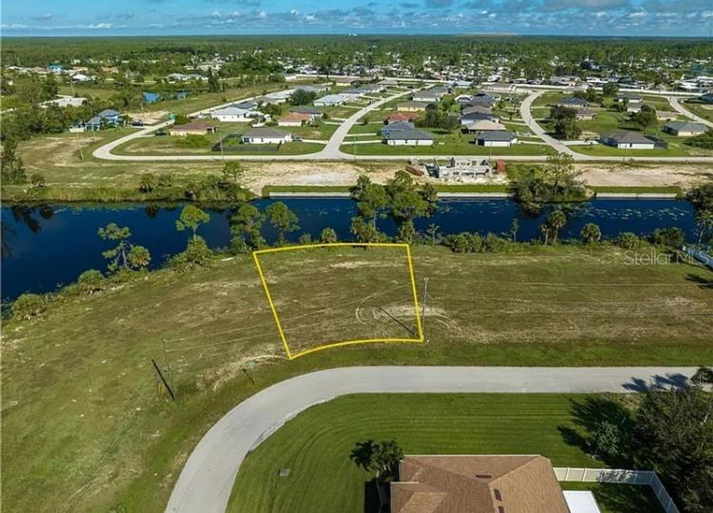Photo of 2117 NE 43rd Lane, Cape Coral, FL 33909 (MLS # TB8484234)