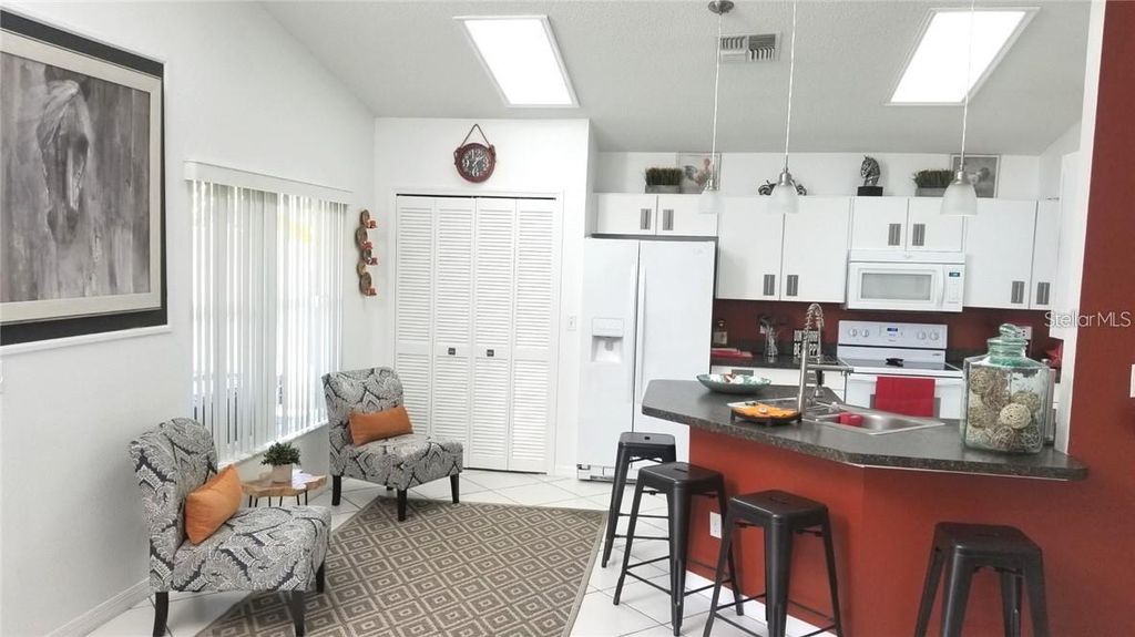 Photo of 11859 Hartfordshire Way, Orlando, FL 32824 (MLS # S5148962)