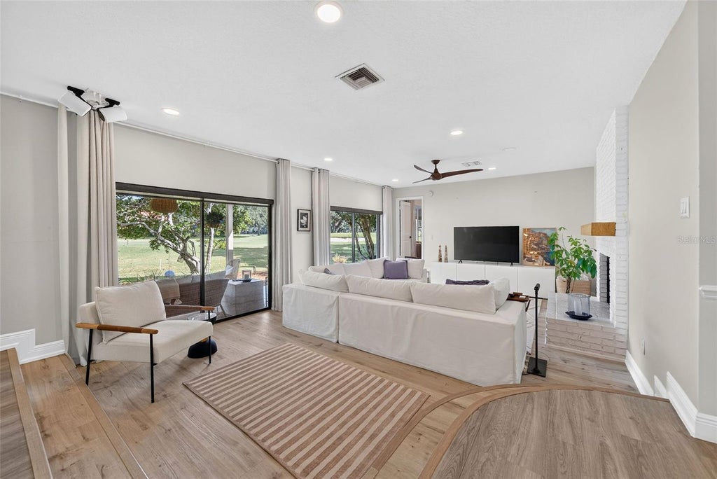Photo of 7601 Orange Tree Lane, Orlando, FL 32819 (MLS # O6446340)