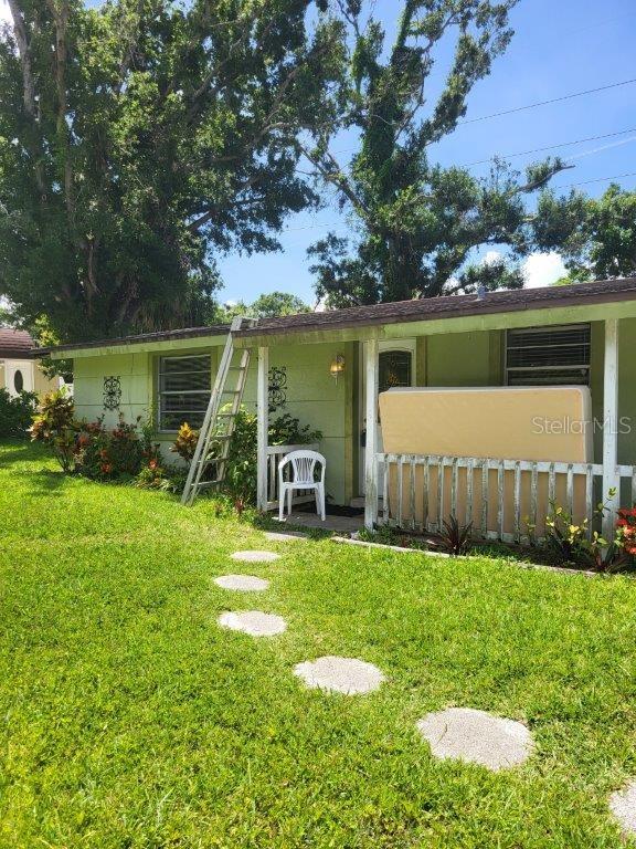 Handyman special. This 2-3BR home has a large living/dining rm plus a family room with wood burning fireplace. Kitchen has wood cabinets and Corian counter. Roof about 10-12 years old. Large lanai in fenced back yard. There is a settlement crack on South side of home. This is on well with central sewer. Great location close to Riverview High School, shopping, restaurants, banking & minutes to Siesta Key Beach.